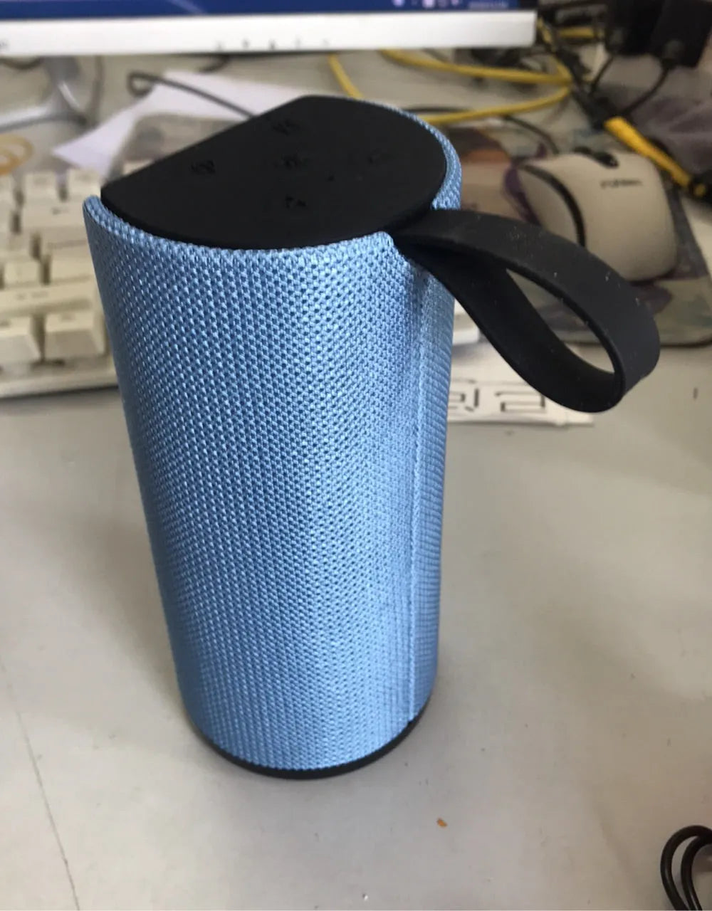 Portable Bluetooth speaker with 5W output, USB interface, and TF card support, shown in black