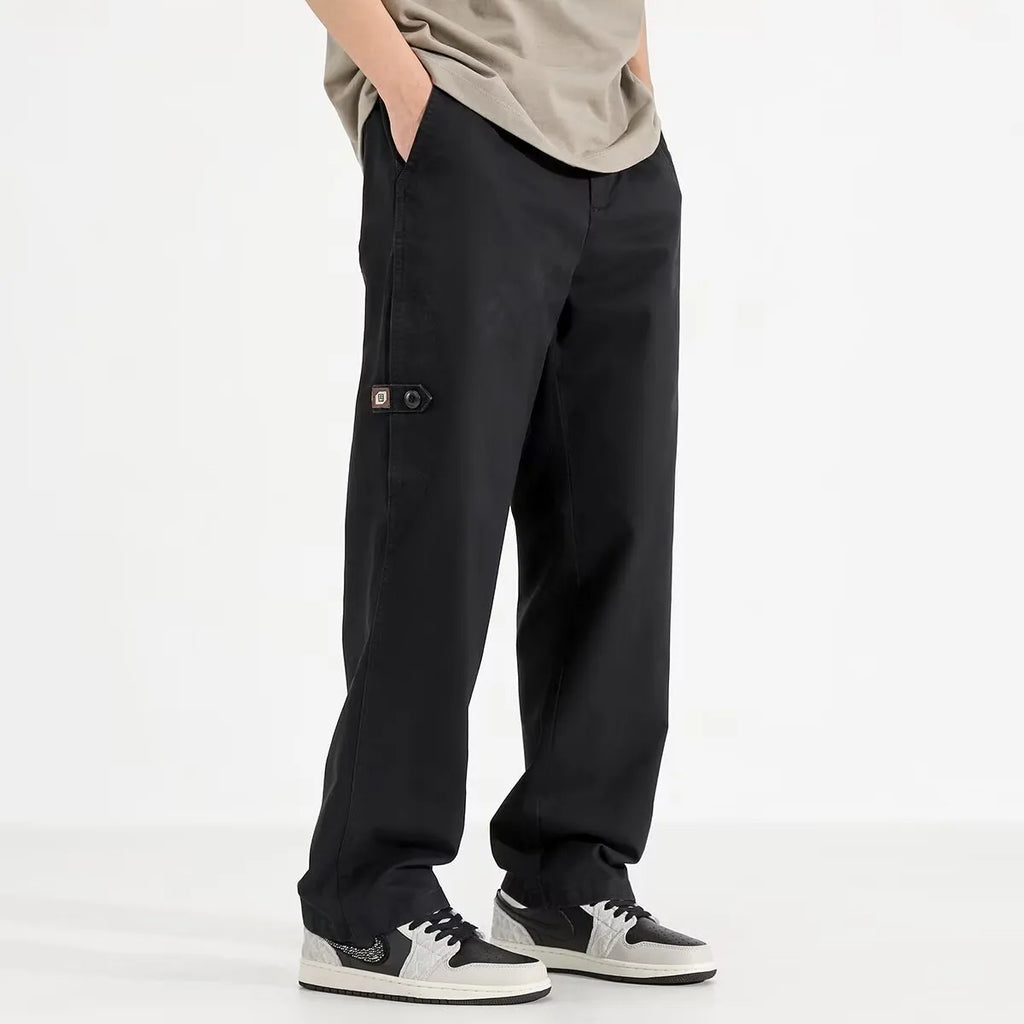 Women's loose wide-leg polyester blend trousers in black, mid-waist drawstring elastic waist, flat lay