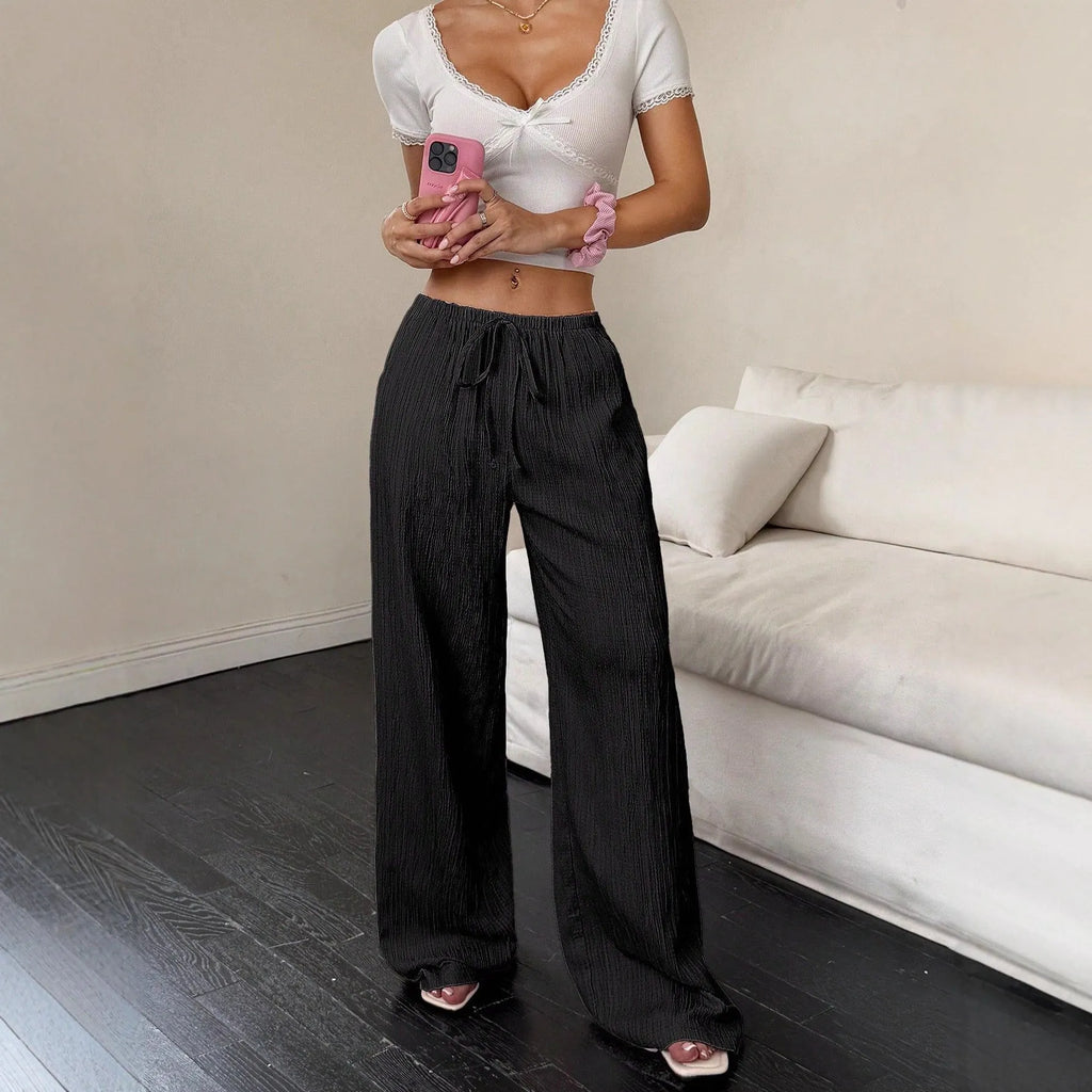 Women's wide leg trousers with lace-up waist trimming in polyester fabric