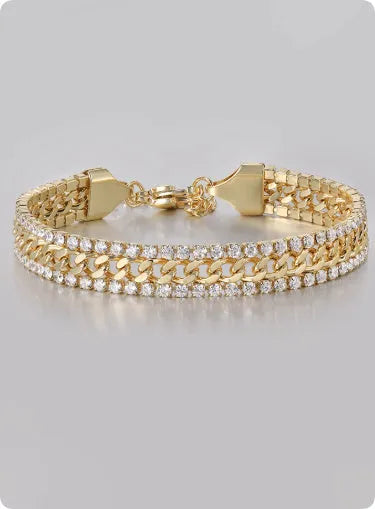 Gold tennis bracelet with artificial gemstone inlay on wrist, showing hip hop style unisex design