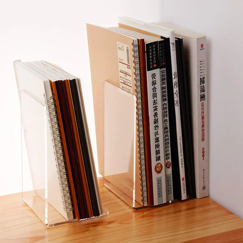Transparent acrylic bookcase displaying textbooks on smooth-edged plexiglass shelf