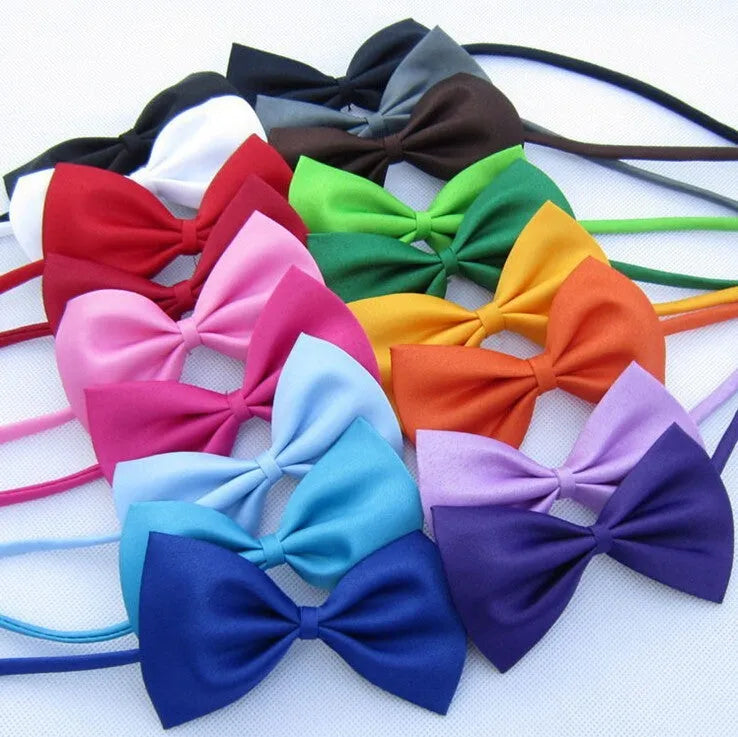 Adjustable dog and cat bow tie neck tie for puppies and small pets in multiple colours including black, red, blue, pink and white