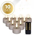 Four taupe-coloured LED tealight candles with a realistic 3D yellow flame effect on a dark surface.