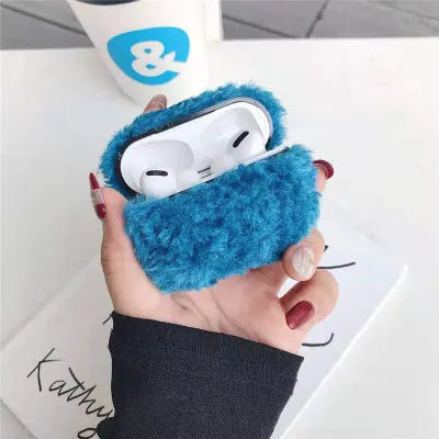 Simple Lamb hard plastic AirPods cover with plush interior in blue, shown next to brown and grey options.