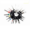 Set of steel needle retractors with colour-coded handles for automotive wire removal in mechanical repair