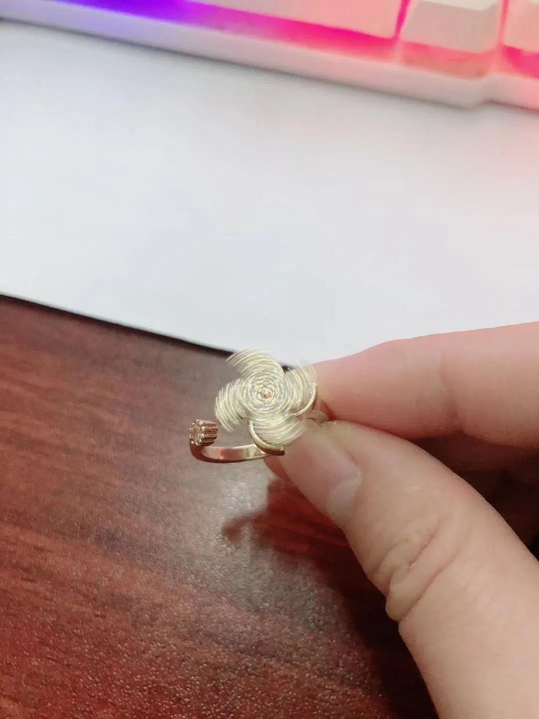 Copper rotating ring with spinning windmill design in gold or silver finish