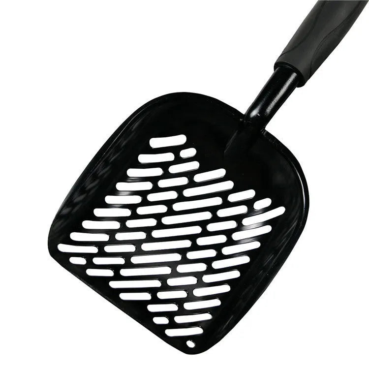 Alloy cat litter scoop with plastic handle on a cat litter box, showing cat face hole design for sifting.