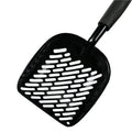 Alloy cat litter scoop with plastic handle on a cat litter box, showing cat face hole design for sifting.