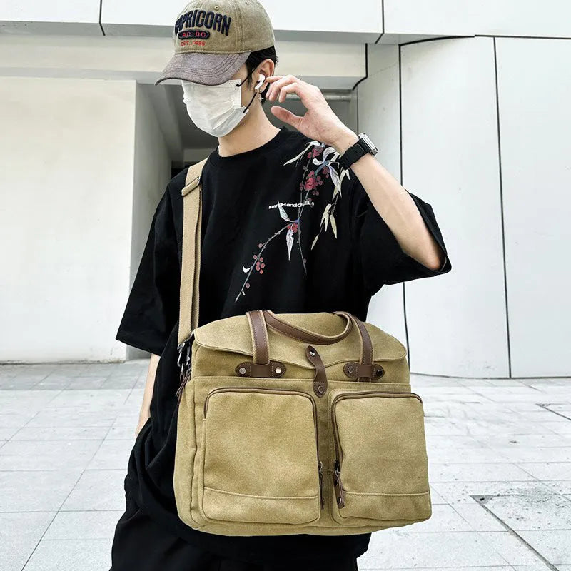 Large capacity canvas men's crossbody bag with multi-compartments, polyester lining, stitching and rivets, black green or khaki