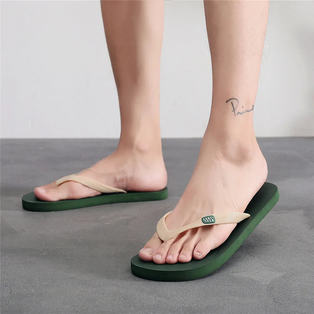 Men's black rubber sole flip-flops with a lightweight EVA upper, shown from the side.