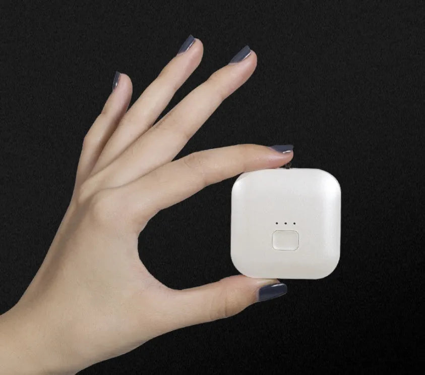USB portable air purifier necklace in blue, pink, grey or white colour options.