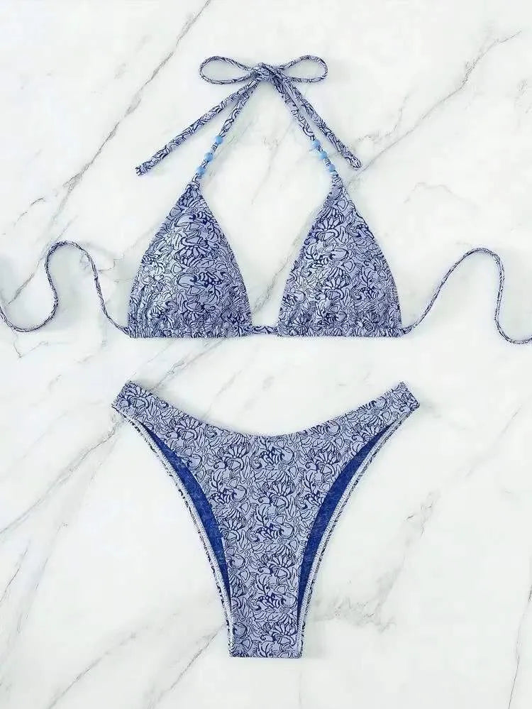 Women's floral halter bikini set with matching shorts in red, sky blue, sapphire blue or emerald green