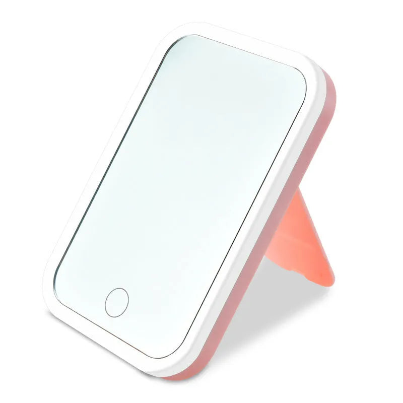 Square LED makeup mirror with smart touch light in pink colour, plastic frame, silver mirror lens