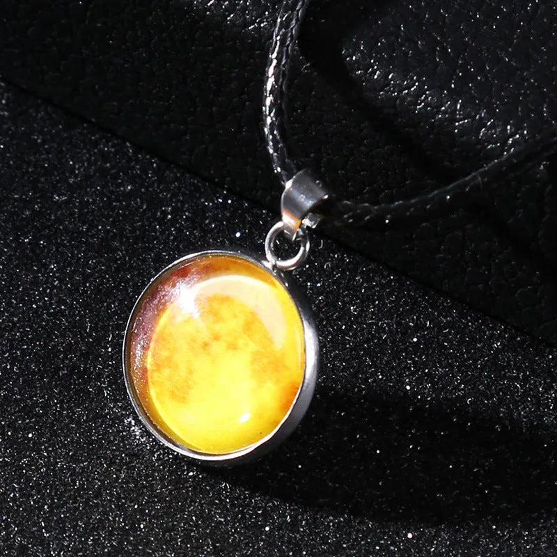 Luminous alloy pendant necklace with constellation design in coloured glass, showing extension chain