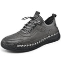 Men's hand-stitched round toe sneakers in black synthetic PU, low heel 1-3 cm, lace-up closure, side view