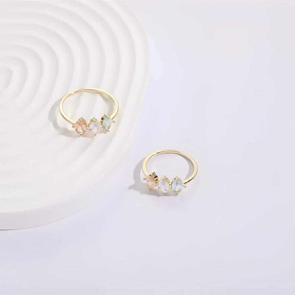 Geometric copper ring with a horse eye motif and tricolour zircon stone, electroplated in 14K Real Gold RG9066 colour.