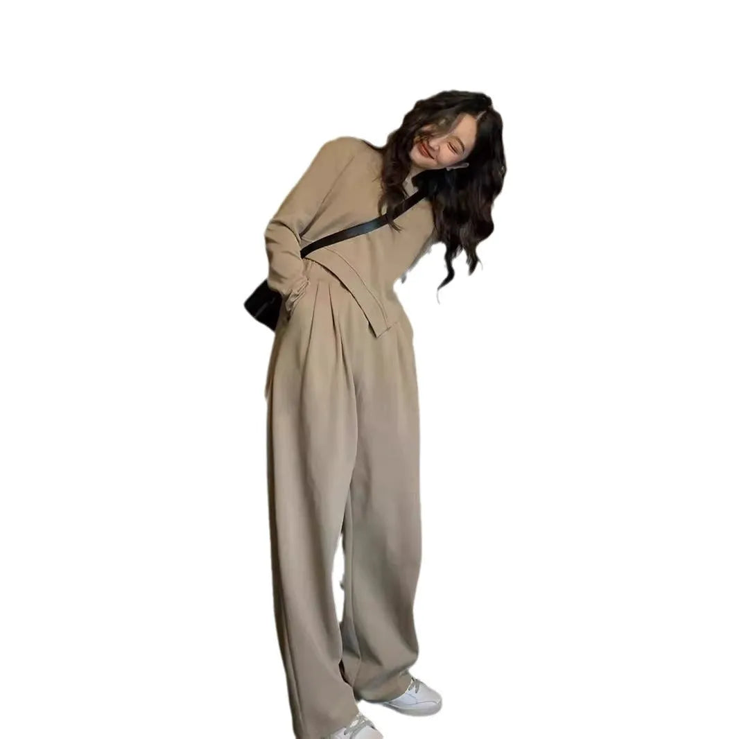 Women's khaki casual sports suit set with long sleeve top and trousers on a hanger