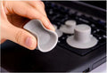 Grey plastic laptop cooling pad stand with four pieces for temperature reduction and ergonomic typing