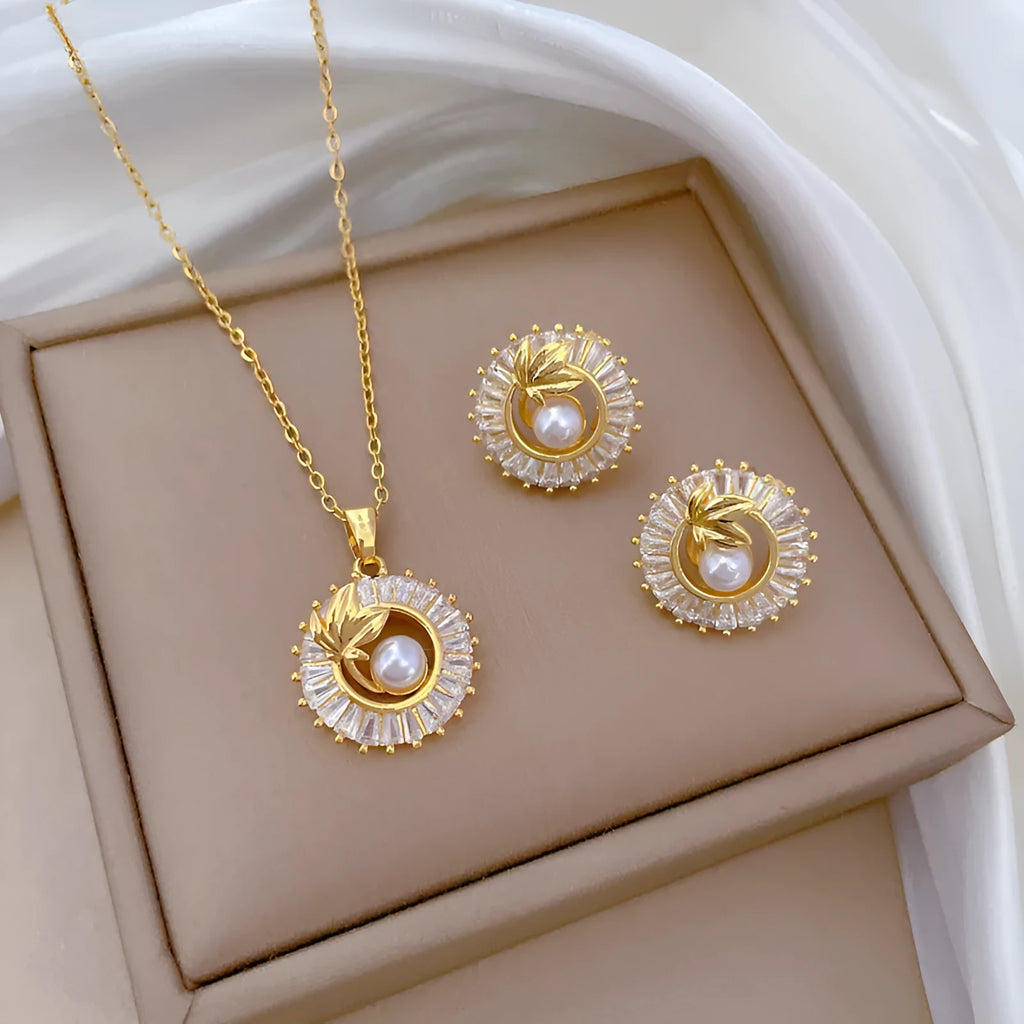 Brass leaf design jewellery set with titanium steel chain necklace and matching stud earrings