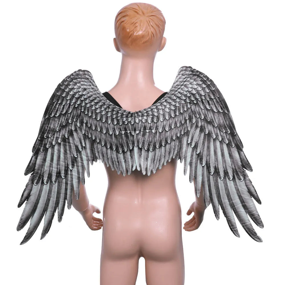 Halloween 3D angel wings in white non-woven fabric with elastic straps on child