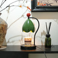 Linglan ancient style melting wax fragrance desk lamp with metal holder in cream white or dark green.