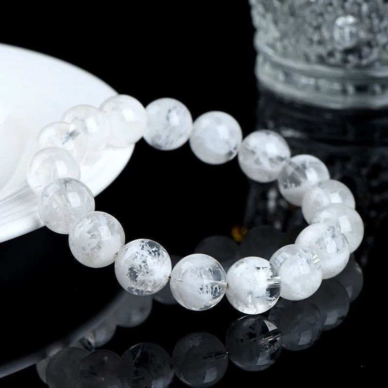 Women's crystal bracelet with geometric design featuring blizzard snowflake beads and traditional Ruyi Xiangyun motifs