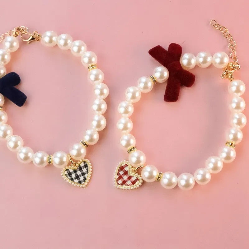 Retro plaid plastic bow necklace for cats and dogs, available in black, pink, and red sizes XS to L
