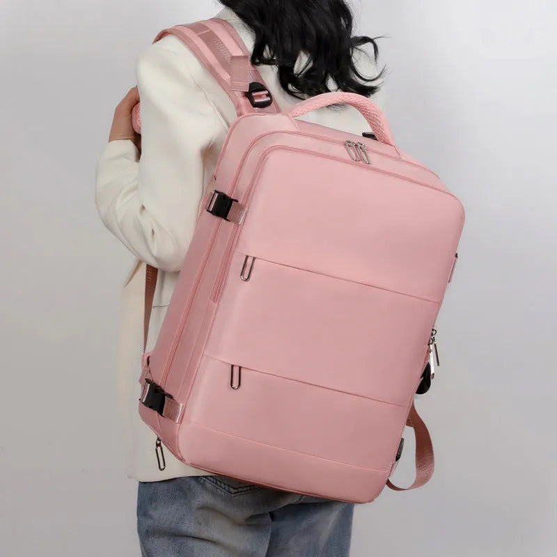 Large purple waterproof travel backpack with laptop compartment and air-cushioned shoulder straps