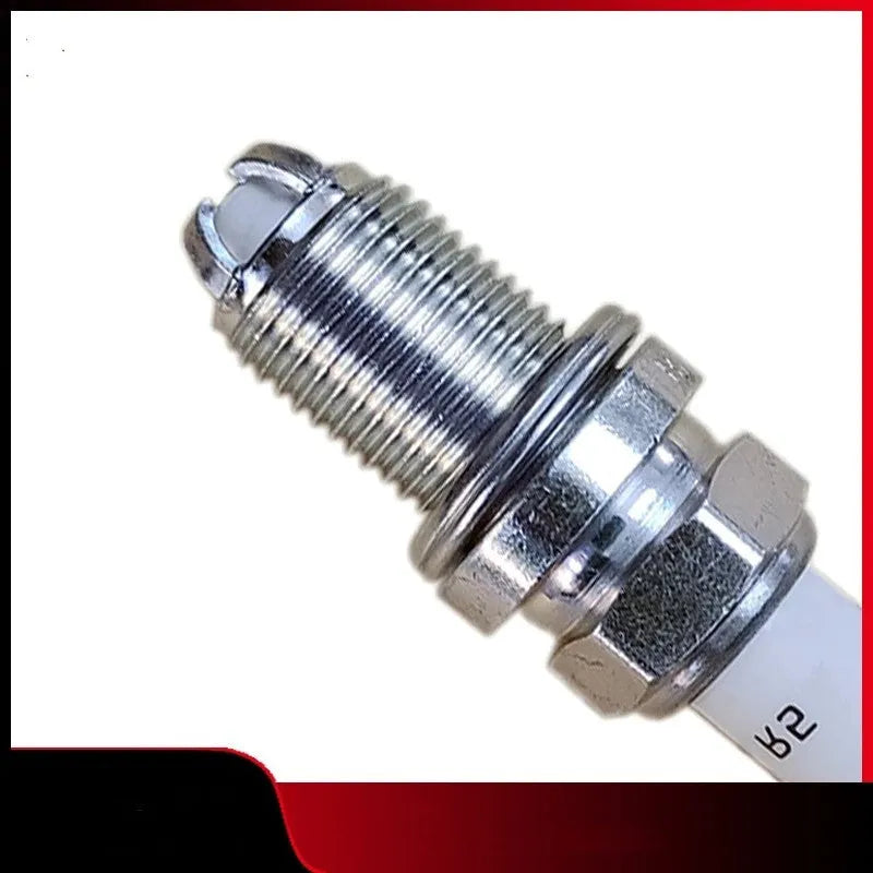 Silver automotive spark plug with 3 kiloohm resistance for BMW, Mini, and Rolls Royce automatic transmission vehicles