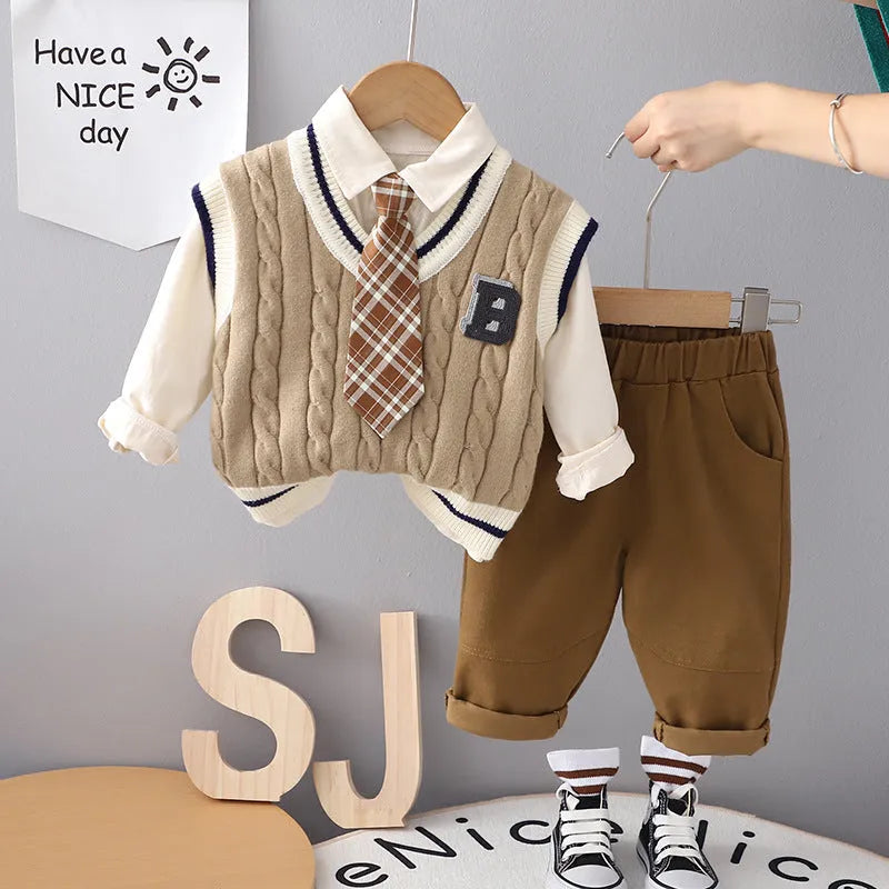 Boys autumn three-piece suit with tie B-shaped sweater pattern, cotton top, trousers, and beige or khaki vest.