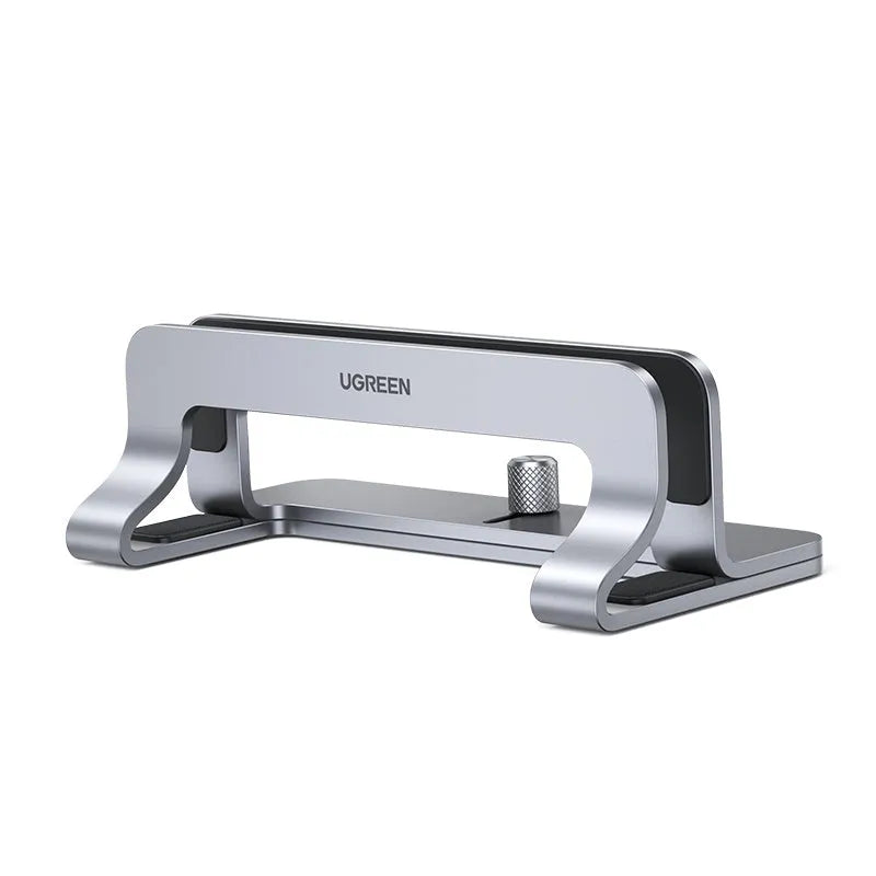 Silver aluminium alloy adjustable computer bracket clamped to a desk edge.