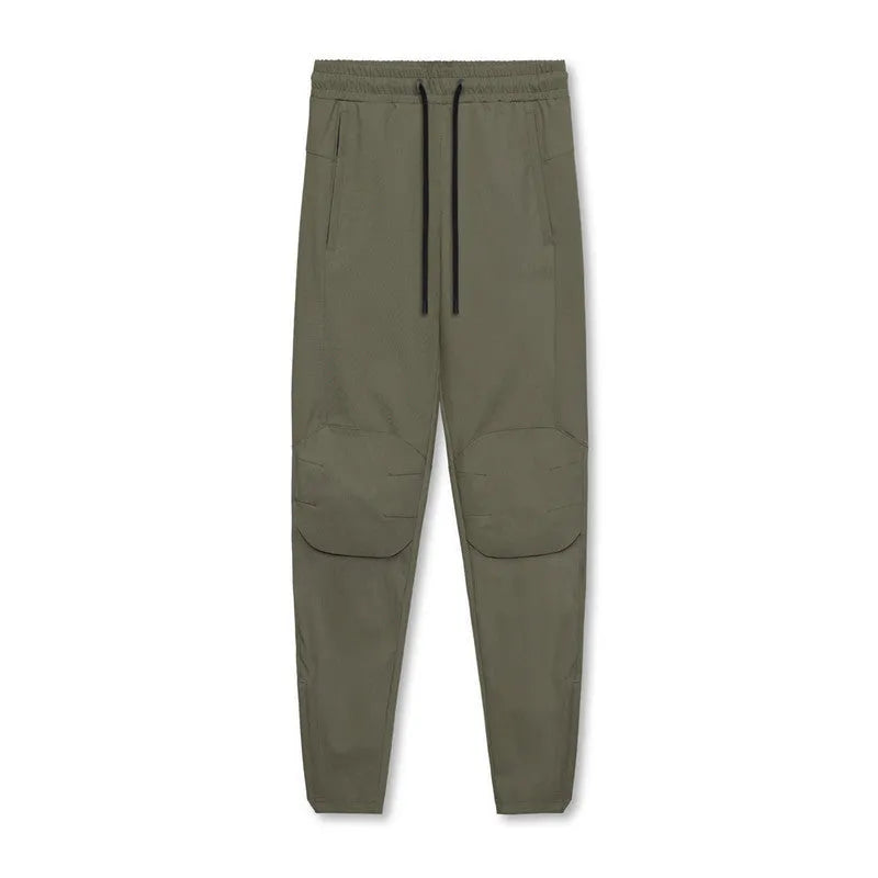Men's grey quick-dry fitness trousers with ankle-tied design for gym workouts
