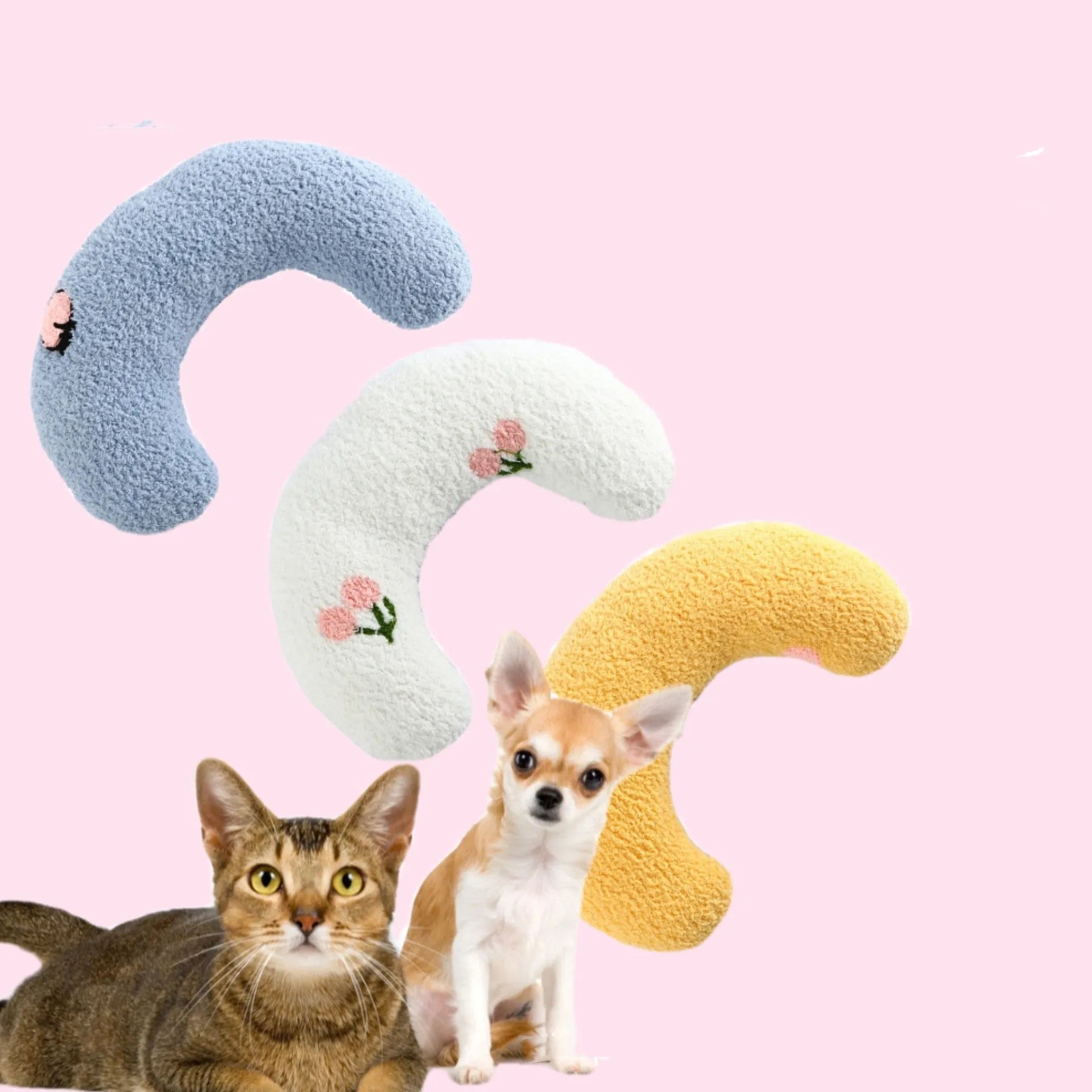 Blue U-shaped plush pet pillow for a small cat or dog on a grey background.
