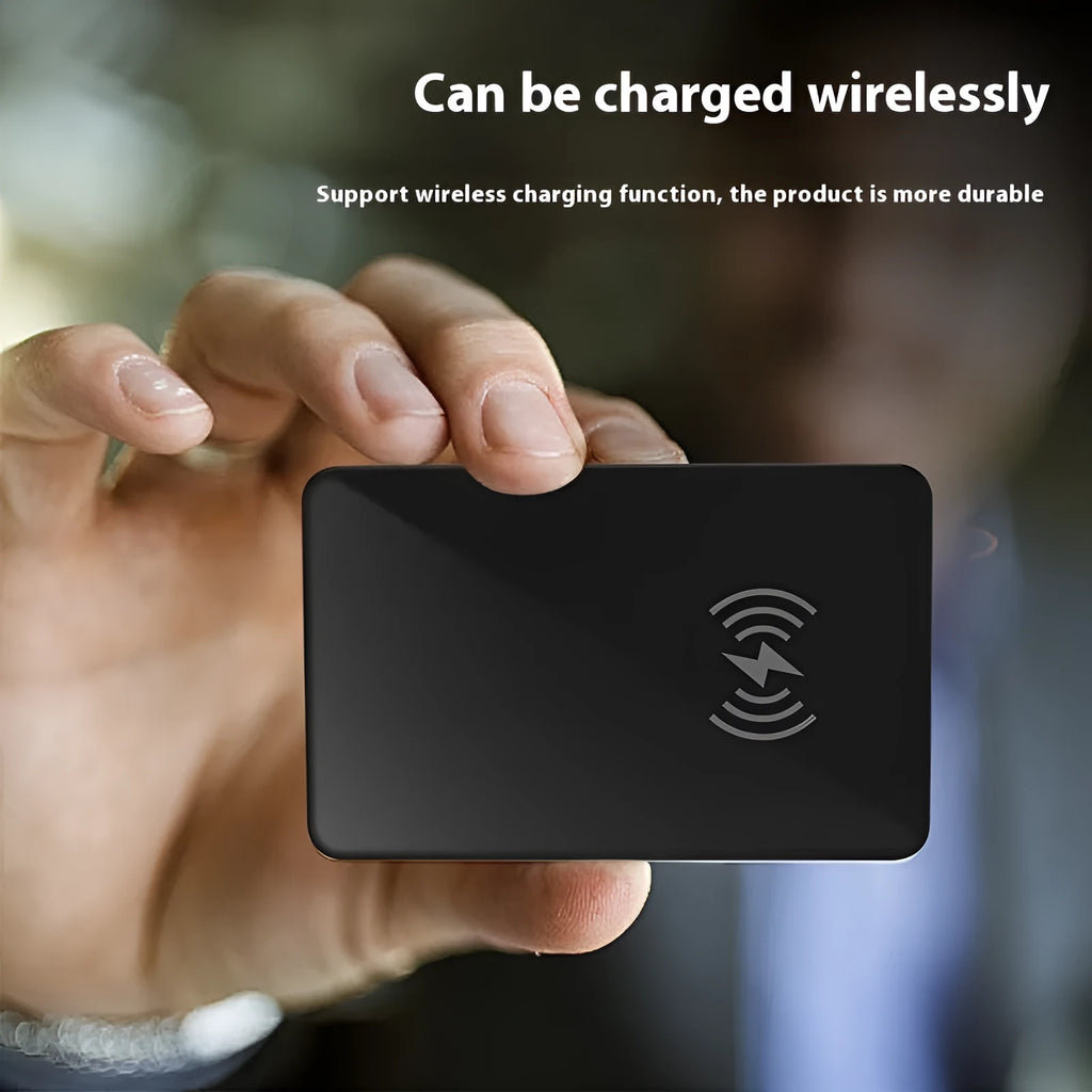 Black pet tracking device with wireless charging and NFC features measuring 85mm by 54mm