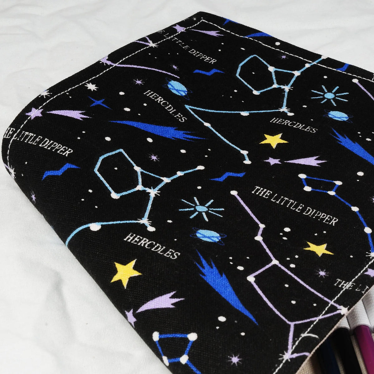 Canvas roll-up pencil case in black starry sky and constellation colours with 12 to 108 hole options