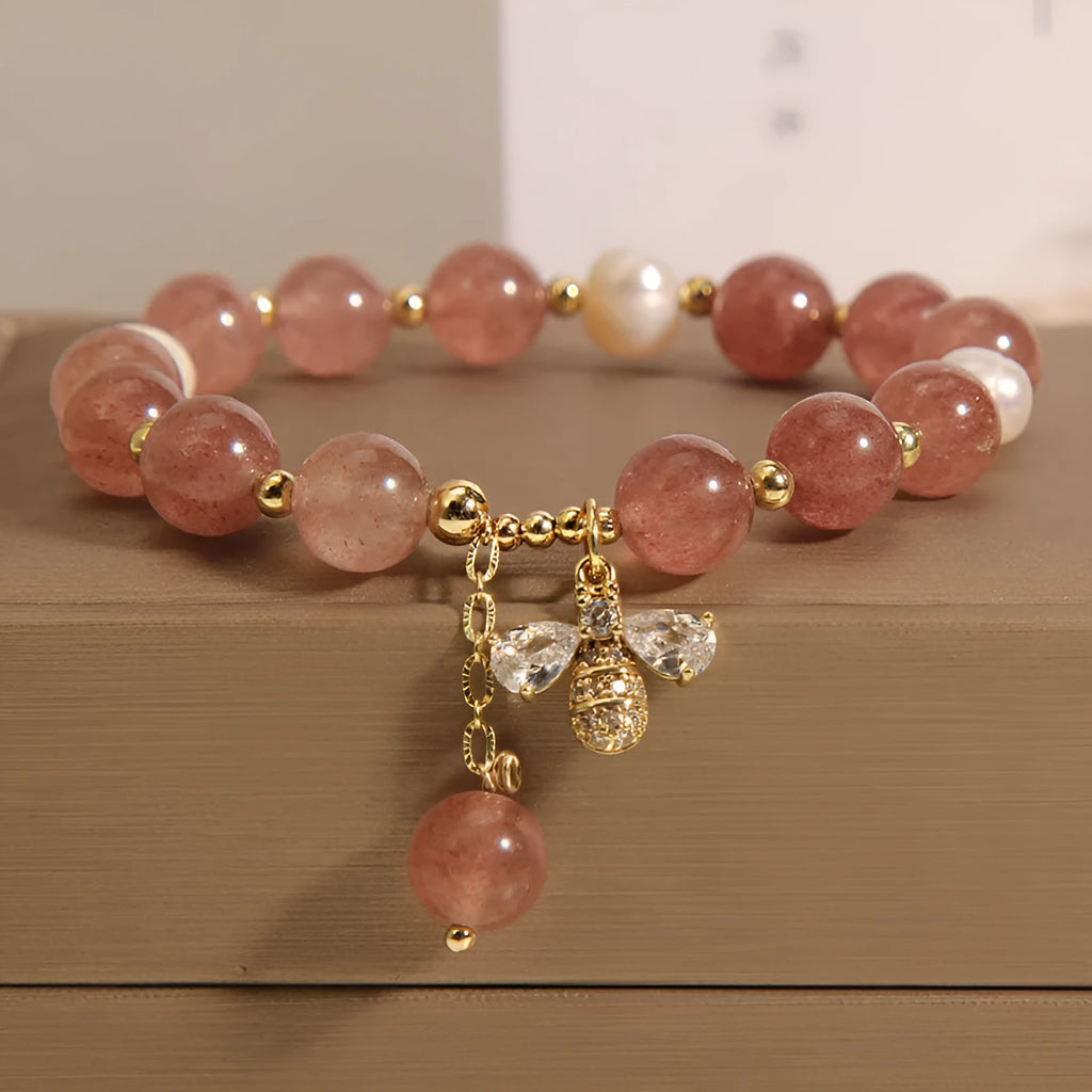 Women's pink strawberry quartz and freshwater pearl bracelet with zircon and alloy accents.
