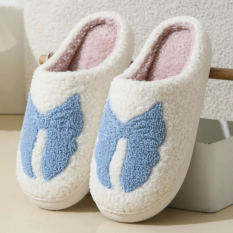 Cartoon bow knot cotton slippers in blue and pink colours with suede upper and TPR sole