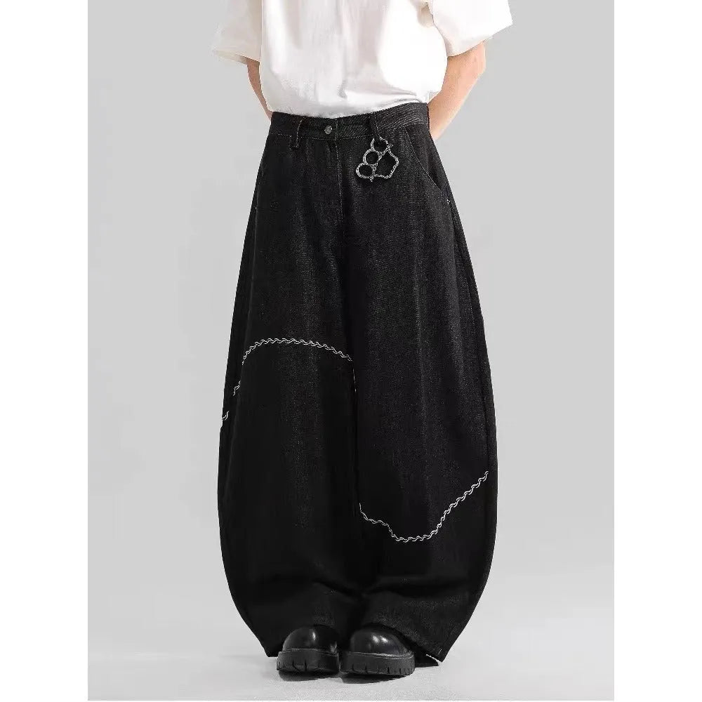 Black straight-leg denim trousers with mid-waist zip placket for autumn winter streetwear