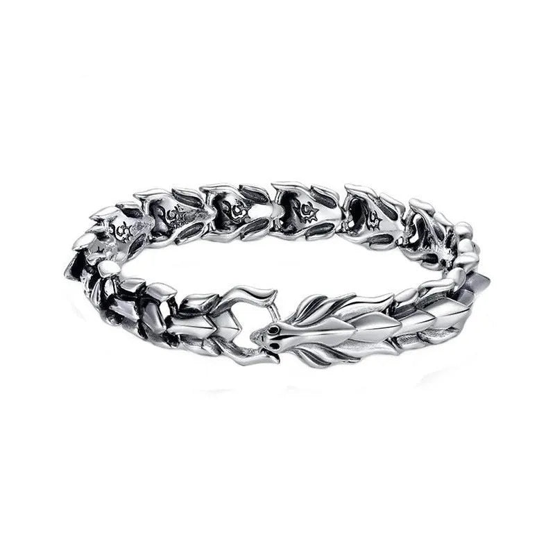 Men's silver geometric keel shape alloy bracelet on a neutral background showing minimal design