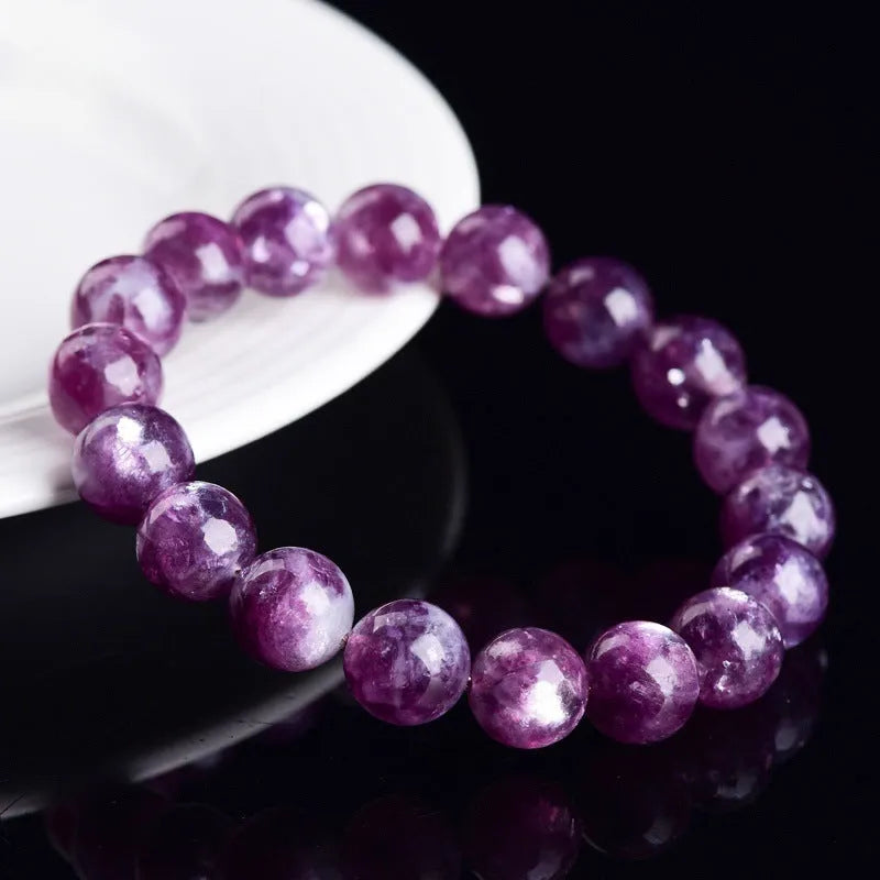 Grandmother polished crystal bracelet in geometric design showing pink purple 5A grade beads.