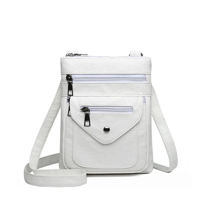 Vertical crossbody mobile phone bag in square shape with sewing line details