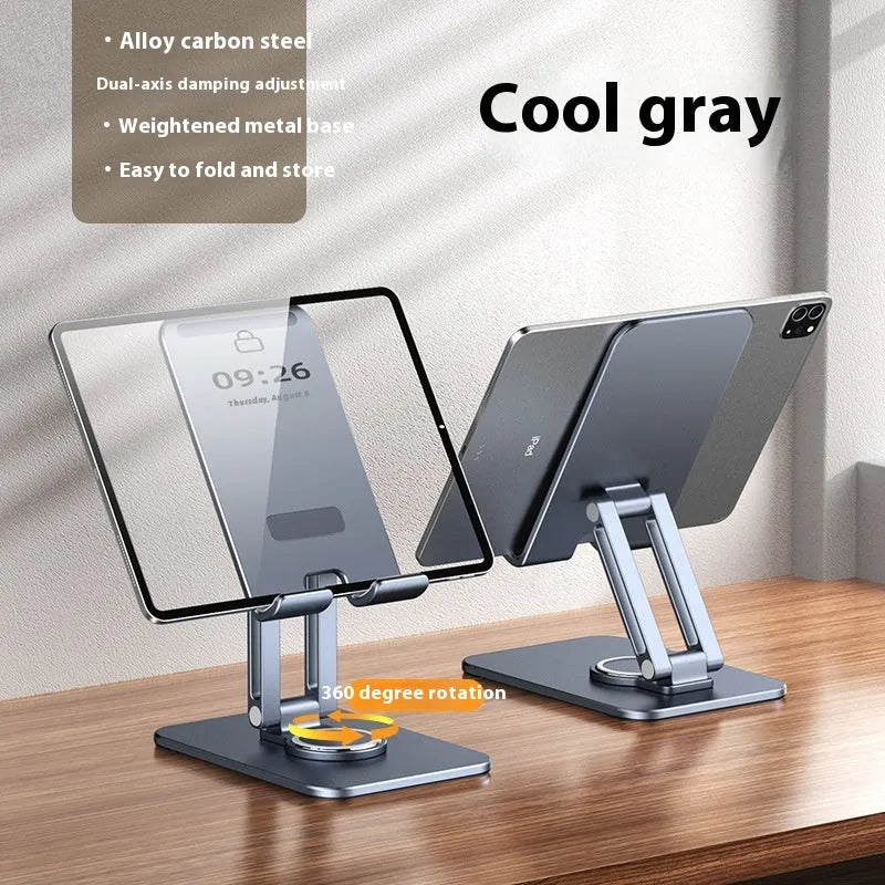Rotatable folding mobile desktop stand phone holder in black on a desk showing adjustable angle
