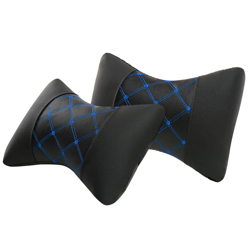 Black quilted diamond pattern car headrest cover with blue stitching, shown on a car seat.