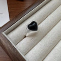 S925 sterling silver adjustable ring with a black heart agate and open-mouth design detail.