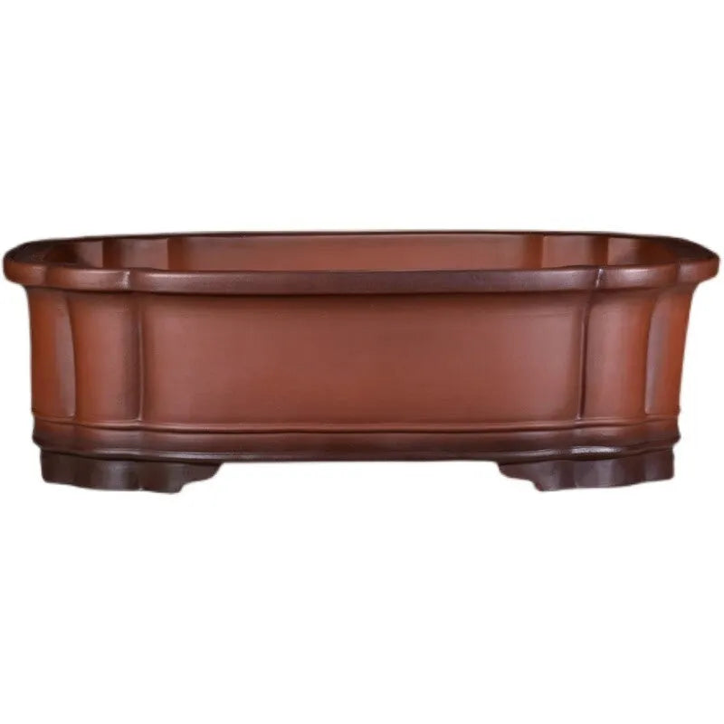 Large Chinese style purple clay flowerpot with antique jade finish and tree stump decoration