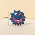 Four natural latex rubber dog squeaky balls with cute faces in blue, green, red and yellow colours