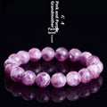 Grandmother polished crystal bracelet in geometric design showing pink purple 5A grade beads.
