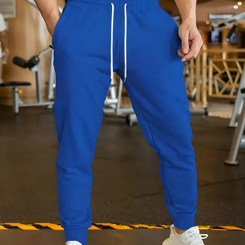 Men's grey linen-style leisure trousers with elastic drawstring waist and loose fit