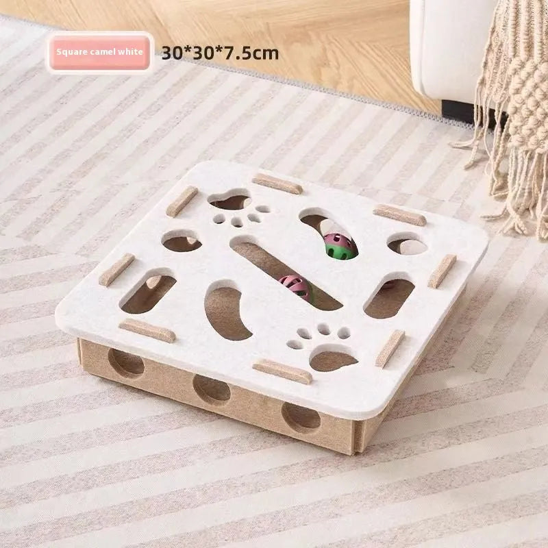 Green brown felt cube cat scratching toy with a square hole in the centre panel.