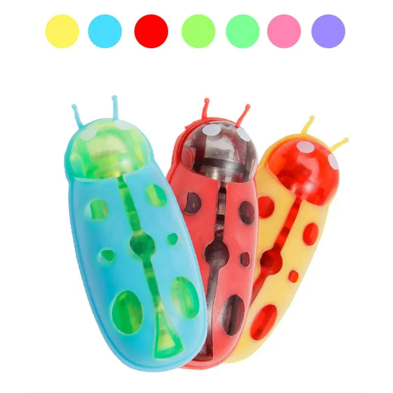 Mini electric bug pet toy with ladybird beetle shape showing angular legs and compact 4.5 cm PVC construction